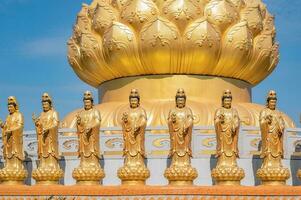 Guanyin goddress with beautiful sky at foguangshan thaihua temple thailand.Fo Guang Shan is one of the four large Buddhist organizations in Taiwan photo