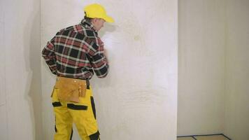 Worker Preparing Interior Walls For Painting video