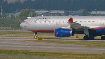 MOSCOW, RUSSIAN FEDERATION JULY 29, 2021 - Passenger aircraft Airbus A330 of Aeroflot airlines taxis after landing or before departure at Sheremetyevo International Airport video