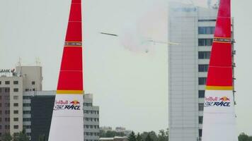 KAZAN, RUSSIAN FEDERATION, JUNE 14, 2019 - Sports plane performs extreme stunts flying in the air at Red Bull Air in Kazan video