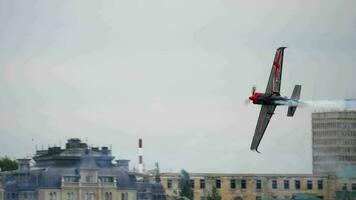 KAZAN, RUSSIAN FEDERATION, JUNE 15, 2019 - Airplane races at the International Red Bull Air Races. Tricks and aerobatics in the air. Racing sports plane, stunt video