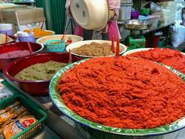 Duri, Indonesia - May 13, 2023 - Traditional smooth spices. Fine spices consisting of red chili, garlic, onion, ginger, etc. photo