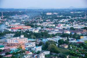 Cityscape view from top of the hill or mountain with blue sky from top of Khao Sakae Krang mountain, Uthai Thani, Thailand. photo