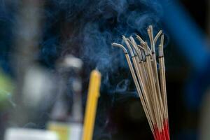 Incense with incense smoke from burning. photo