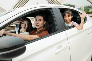 Image of young Asian family travel photo