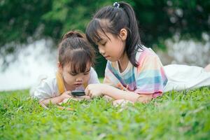 Photo of young Asian baby girl playing at park