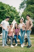 Group Asian people picnic outside photo