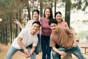 Group Asian people picnic outside photo