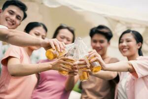 Group Asian people picnic outside photo