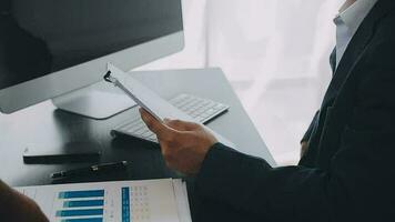 Audit concept,Administrator business man financial inspector and secretary making report calculating balance. Internal Revenue Service checking document. video