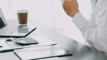 Audit concept,Administrator business man financial inspector and secretary making report calculating balance. Internal Revenue Service checking document. video