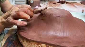 Working With Clay in Ceramic Workshop video