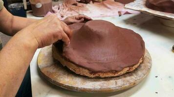 Working With Clay in Ceramic Workshop video