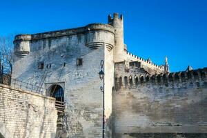 Detail of the historical wall built on the fourteenth century around the Avignon city in a beautiful sunny day photo