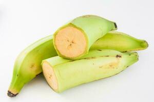 Plantain or Green Banana isolated in white background. Musa x paradisiaca photo