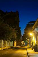 Night view of  Callejon de los Estribos in the walled city of Cartagena de Indias in Colombia photo