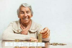 Senior woman budget with big savings for travel photo