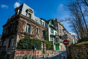 Corner on the steep streets of the famous Montmartre neighborhood in Paris photo