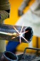 Cutting a tube using electric welding photo