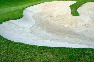 Golf course sand pit bunker aesthetic background,Used as obstacles for golf competitions for difficulty and falling off the course for beauty. photo