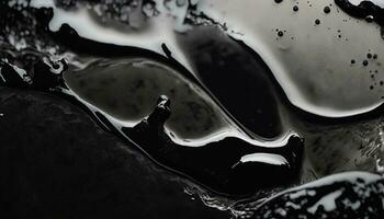 Abstract black fluid, black ink background photo