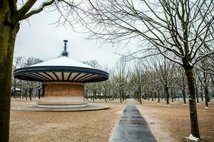 Walking path at the Luxembourg Palace garden in a freezing winter day just before spring photo