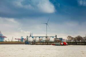 Hamburg port on a dark cloudy end of winter day photo