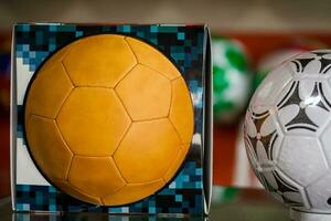 Soccer balls made at the traditional factories of the beautiful small town of Mongui in Colombia photo