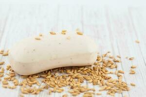 Oatmeal soap and whole grains. Avena sativa photo