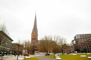 View of the Saint Peter church in a cold rainy early spring day photo