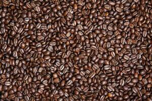 Horizontal background of roasted Colombian coffee beans photo