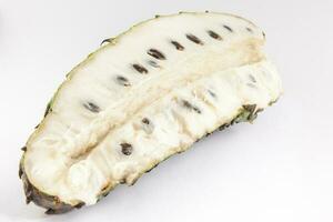 Tropical fruit called soursop isolated on white background. Annona muricata photo