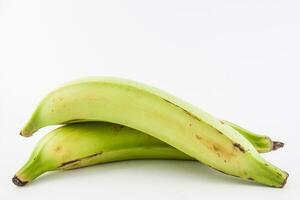 Plantain or Green Banana isolated in white background. Musa x paradisiaca photo