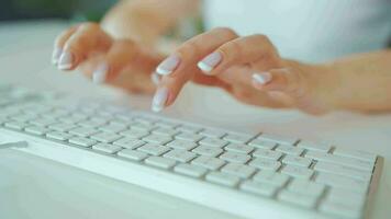 Woman typing credit card number on computer keyboard. She making online purchase. Online payment service video