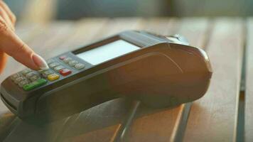 NFC credit card payment. Woman paying with contactless credit card with NFC technology. Wireless money transaction video