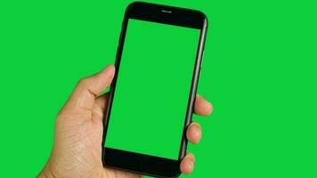 Phone green screen, green screen of hand holding and using phone, smartphone green screen, touch screen smartphone, chroma key phone video