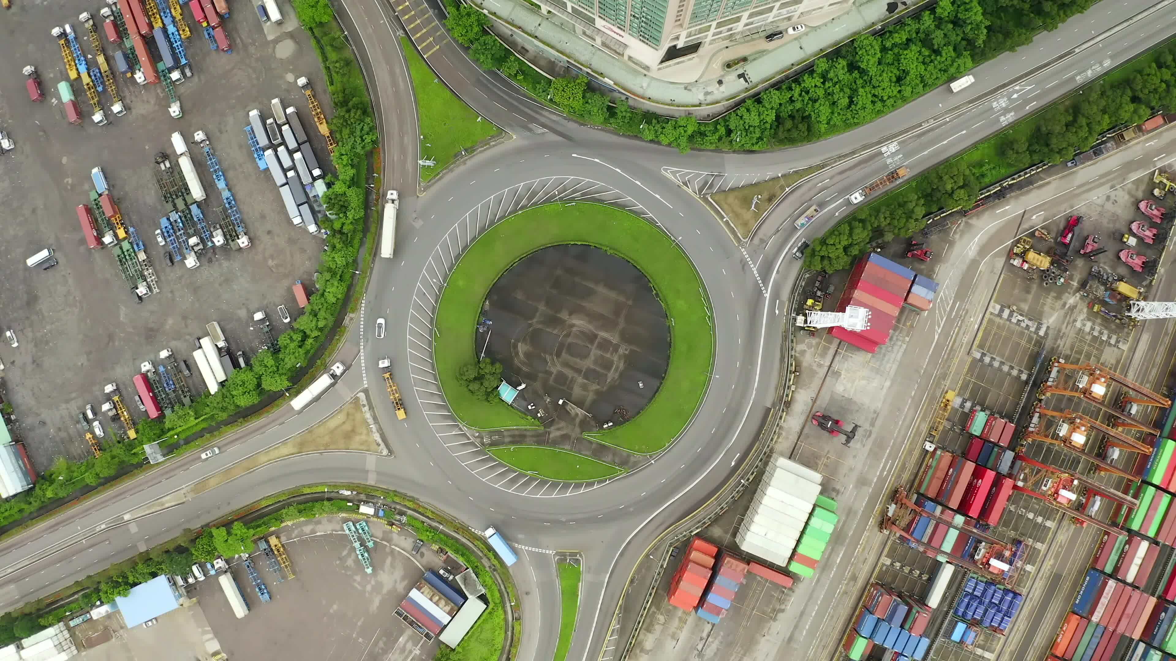 4K Aerial top view of Circling Roundabout in Hong Kong city. highway
