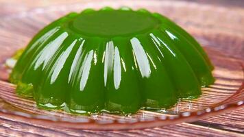 close up of green jelly on plate on table video