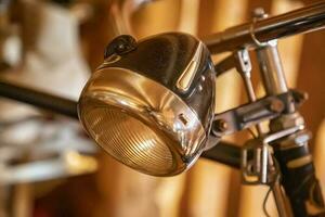 The front lights of an old bicycle. Vintage view photo