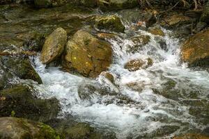 Scenic view of amazing water stream between rocks. Close up photo