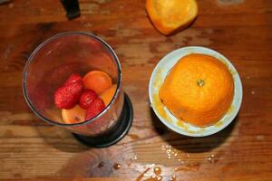 Fresh fruit juice in a blender photo