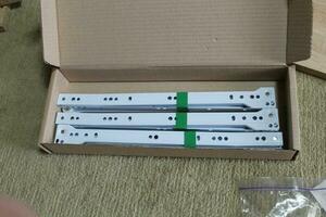 Assembling dresser furniture for storing clothes photo