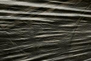 Black plastic bag texture background photo