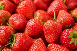 Fresh organic red strawberry fruit background photo