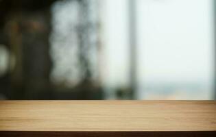 Empty wood table top and blur of out door garden background Empty wooden table space for text marketing promotion. blank wood table copy space for background photo