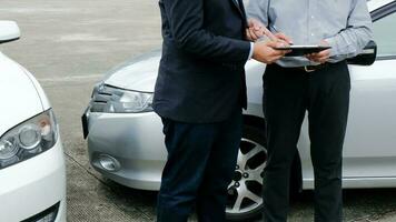 Loss Adjuster Insurance Agent Inspecting Damaged Car. photo