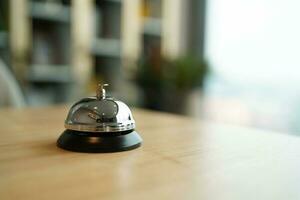 Hotel reception counter desk with service bell. photo