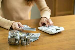 Woman hand money and giving donate charity raise donation concept photo