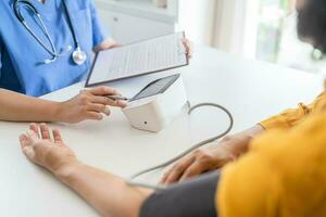 Doctor checking  patient arterial blood pressure. Health care. photo