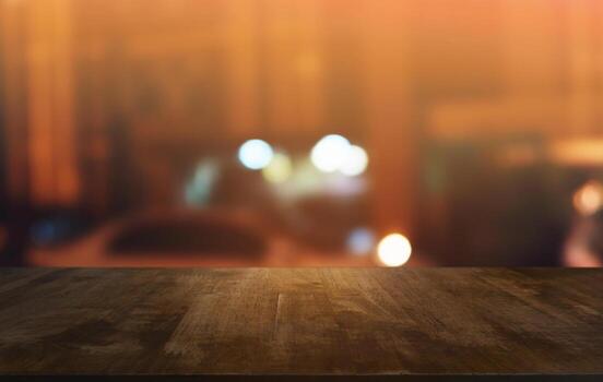 Empty dark wooden table in front of abstract blurred bokeh background of restaurant . can be used for display or montage your products.Mock up for space. photo